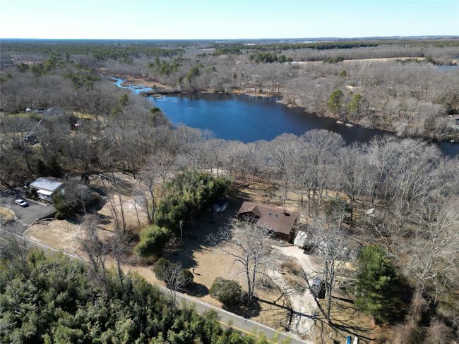 Birds eye view of property with a forest view and a water view | Image 28