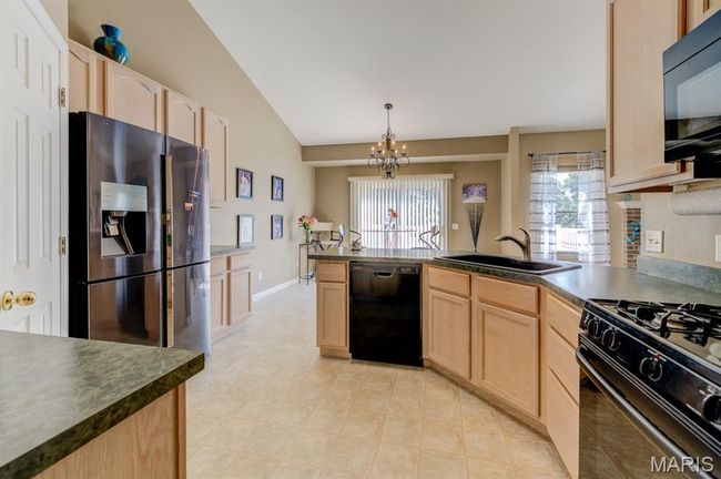 The kitchen also has a refrigerator, gas range, new microwave and new dishwasher. | Image 11