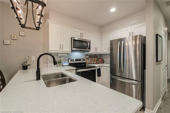 8 - 992 Windham Lane, House attached with 2 bedrooms, 1 bathrooms and 2 parking in Windham Centre ON | Image 9