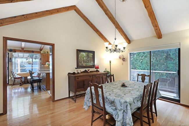 OPEN CONCEPT DINING/LIVING AREA with DECK ACCESS | Image 5