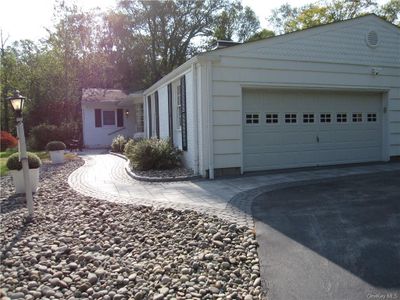 View of side of property with a garage | Image 3