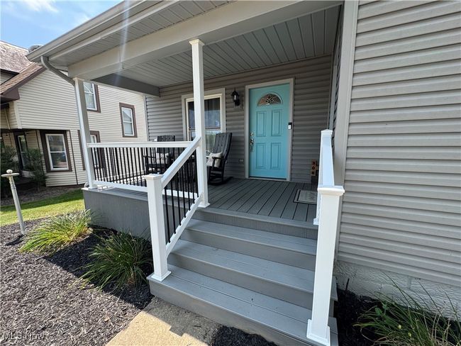 Entrance to property with a front porch | Image 7