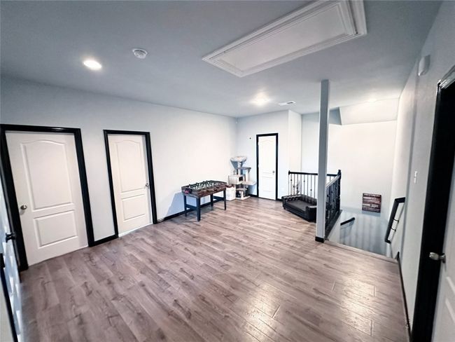 Upstairs loft area showing potential game area, sitting room, gym, second living area, etc | Image 18