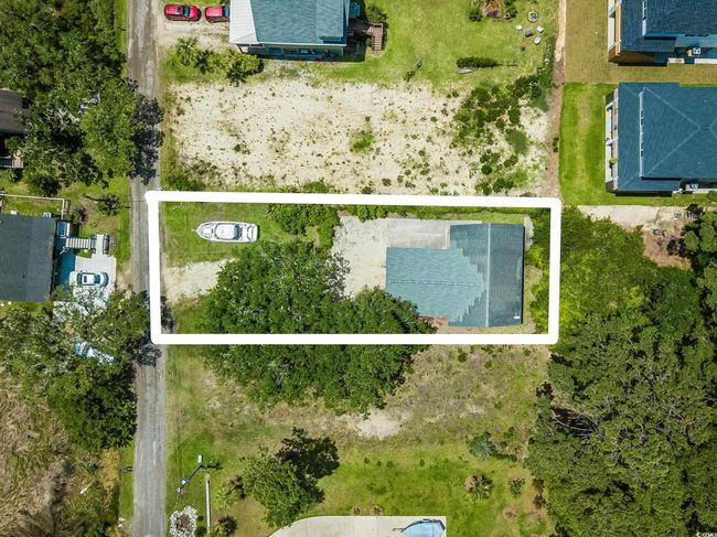 Aerial view of property and surrounding area with property parcel outlined | Image 26