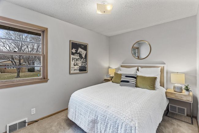 The third bedroom is located on the front of the home and is across from the flex space. | Image 21