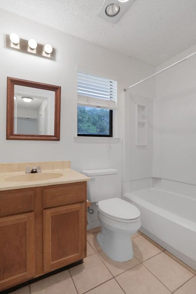 Full bath featuring vanity and a bathtub / shower combination | Image 26