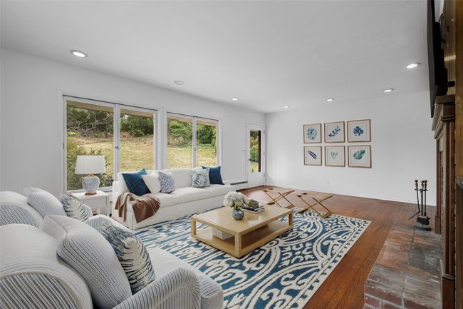 Living room with easy access to back patio/backyard. Virtually staged. | Image 6
