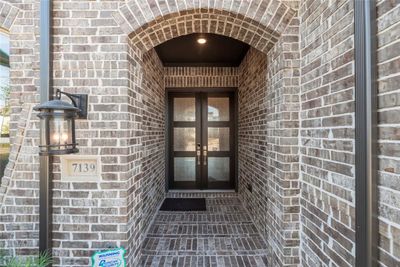 An entrance like this can certainly leave a lasting impression. It's not just a doorway; it's a statement, setting the tone for what awaits beyond. | Image 3