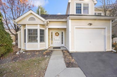 View of front of home featuring a garage | Image 3