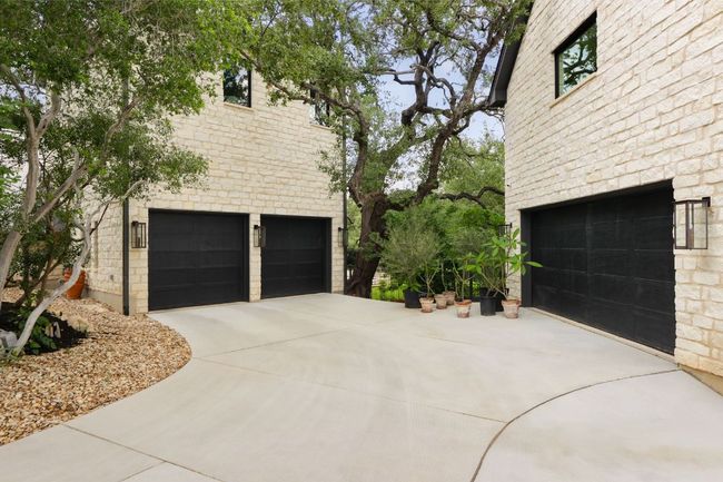 Garage featuring driveway | Image 37