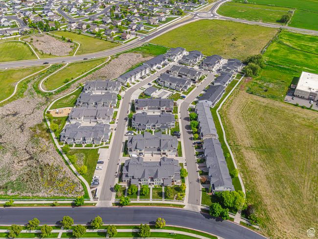 Aerial view of property's location with nearby suburban area | Image 26