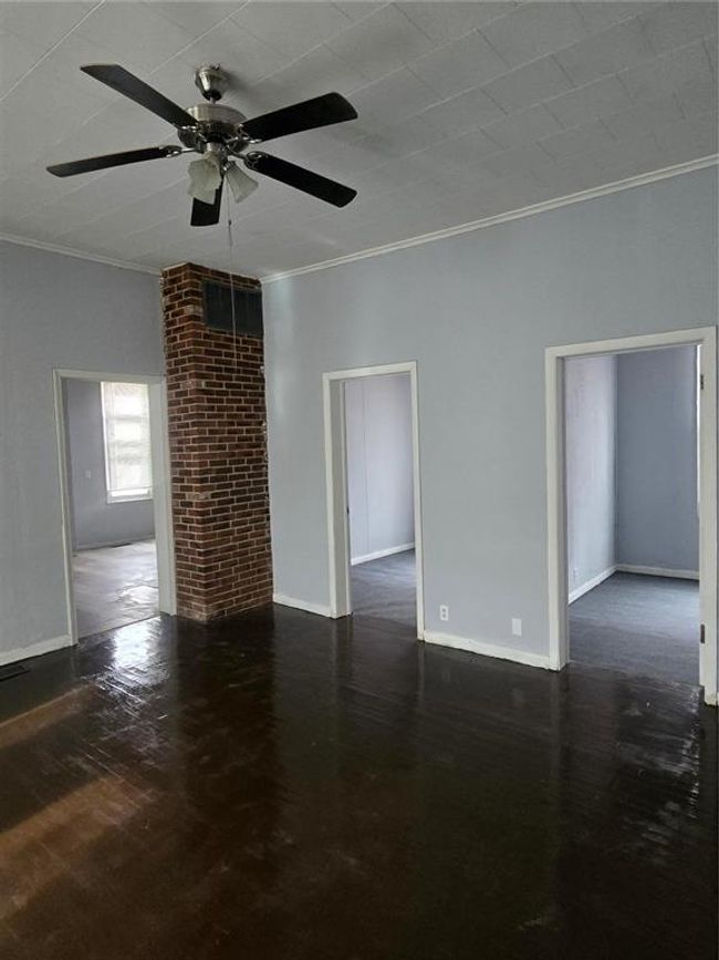 Spare room with ornamental molding and ceiling fan | Image 5
