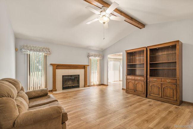 Natural fireplace graced by natural light on both sides | Image 6