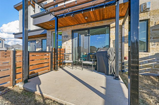 View of patio featuring grilling area | Image 26