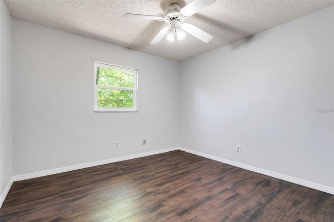 13635 Berkshire Ct, House other with 3 bedrooms, 2 bathrooms and null parking in GRAND ISLAND FL | Image 13