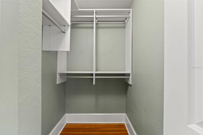 secondary bedroom with walk-in closet | Image 19