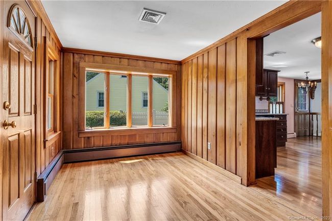 Built as the original Dining Room the alcove between the Kitchen and Living Room is well suited for a desk and study area. | Image 11