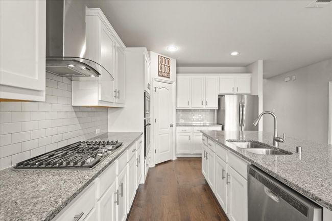 A corner pantry and plenty of cabinet storage | Image 8