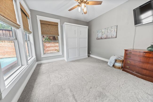 1st floor bedroom with pool views | Image 16