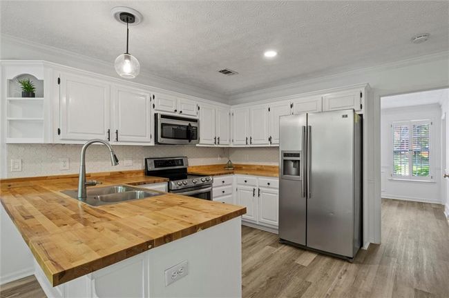 4220 Singing Post Ln Ne, House other with 5 bedrooms, 3 bathrooms and 2 parking in Roswell GA | Image 16