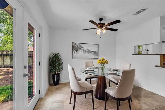 Breakfast room with new French doors. Virtually staged. | Image 19