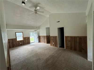 Another view of the spacious living room. | Image 3