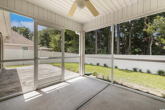 Unfurnished sunroom with a ceiling fan | Image 30