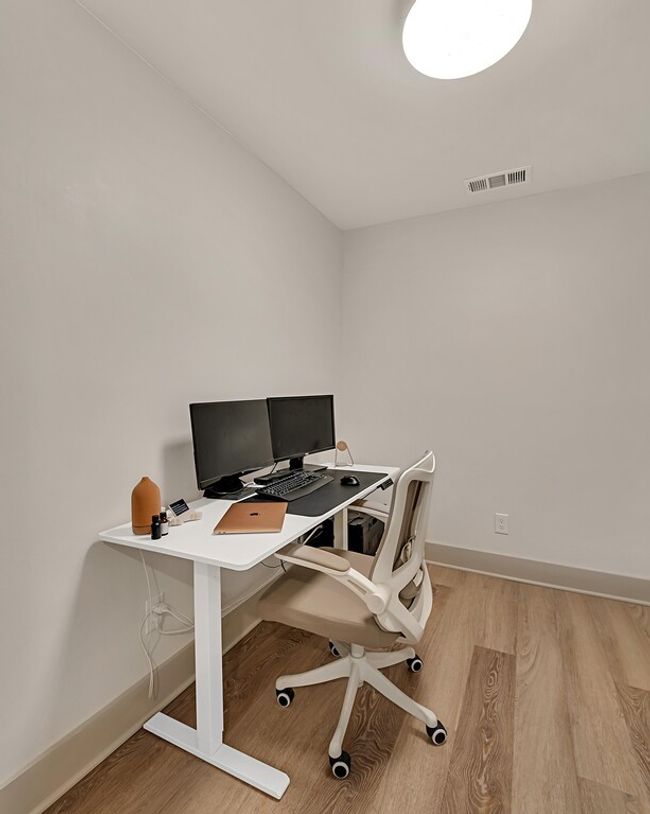 Home office or bedroom featuring wood finished floors | Image 23