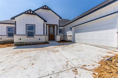 View of front of house featuring a garage | Image 3