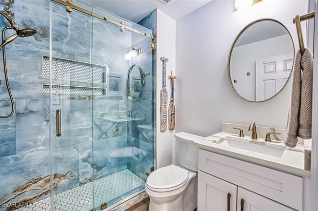 Full bath featuring vanity and a shower stall | Image 36