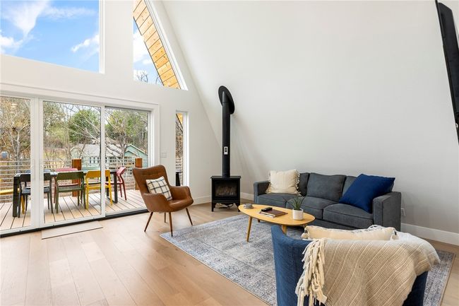Open living room with propane stove. | Image 12