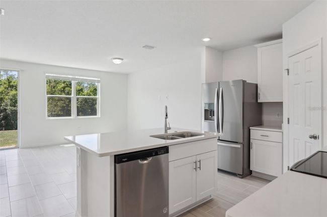 16403 Bird Of Paradise Ave, Townhouse with 3 bedrooms, 3 bathrooms and null parking in CLERMONT FL | Image 12