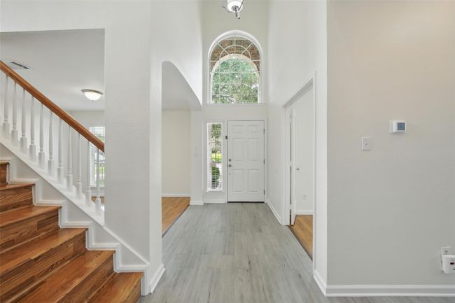 Walking in the front door you have an office or 5th bedroom on your left & an open space on your right that is perfect for your flex space. | Image 6