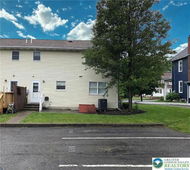 Back. The first 2 parking spaces are for this home. | Image 18