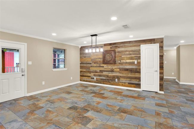 Large dining area with custom woodwork and Designer lighting | Image 27
