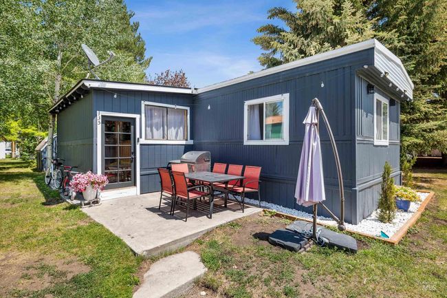 Back of house featuring a patio and a yard | Image 23