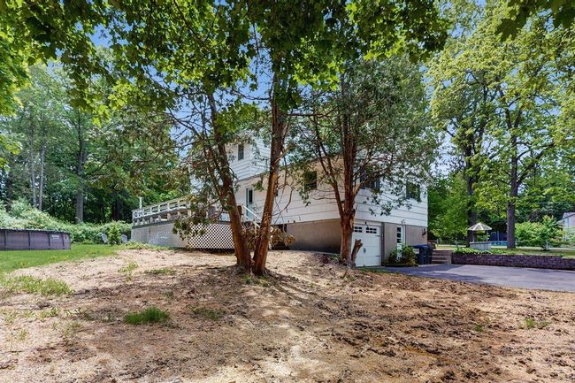 View of side of property. The brown areas in the picture are new grass seeded areas as a result of the installing the brand new Septic System! | Image 38