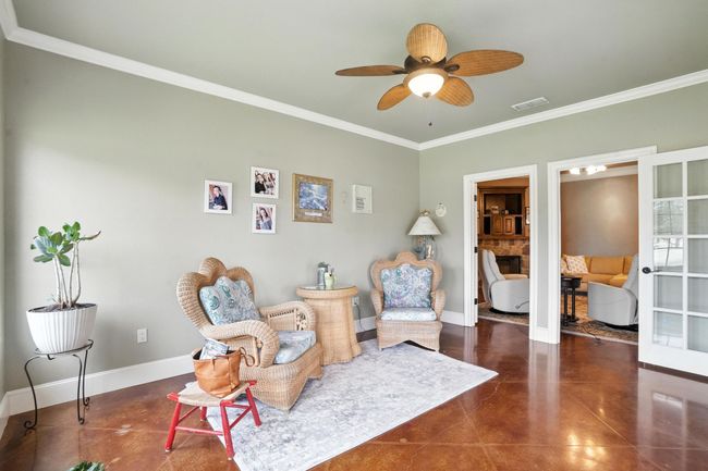Sitting room featuring ornamental molding and a ceiling fan | Image 20