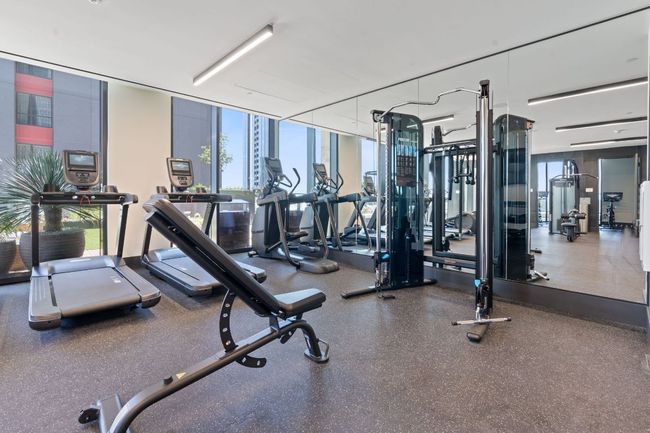 Workout area with floor to ceiling windows | Image 34