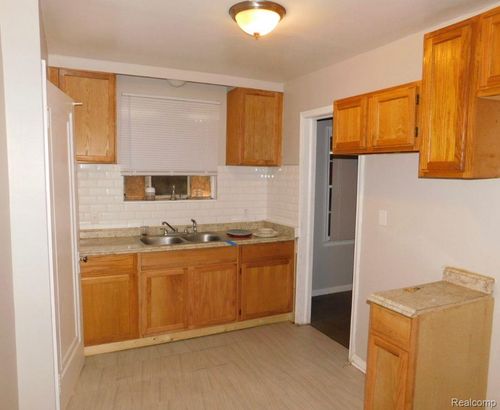 20502 Riopelle St, Highland Park, MI, 48203-1254 | Card Image