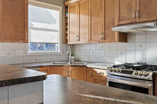 716 Boulder Creek Drive Se, House other with 4 bedrooms, 4 bathrooms and 4 parking in Langdon AB | Image 11