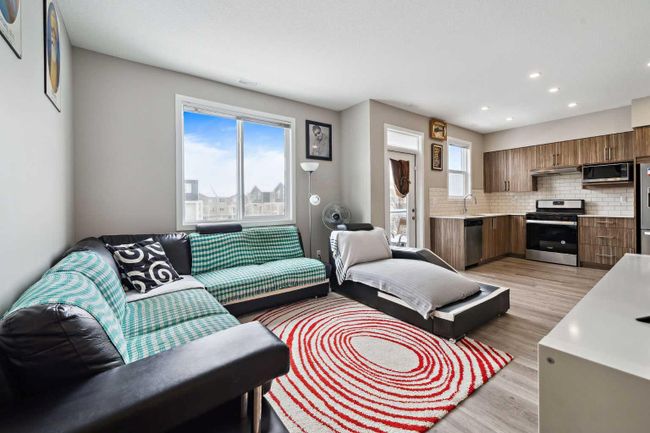 202 - 215 Redstone Ne, Home with 2 bedrooms, 2 bathrooms and 1 parking in Calgary AB | Image 3