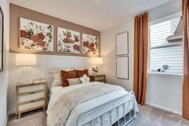 Carpeted bedroom featuring baseboards | Image 8