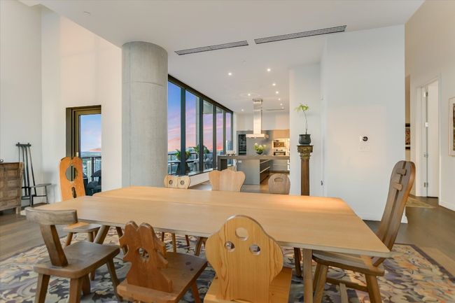Open to both the kitchen and living room, this space fosters effortless flow for entertaining and everyday living. | Image 11
