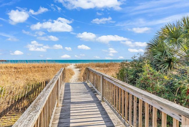 View of home's community featuring view of water and beach | Image 27