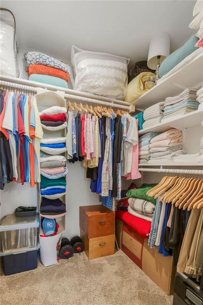 Walk in closet with carpet floors | Image 20