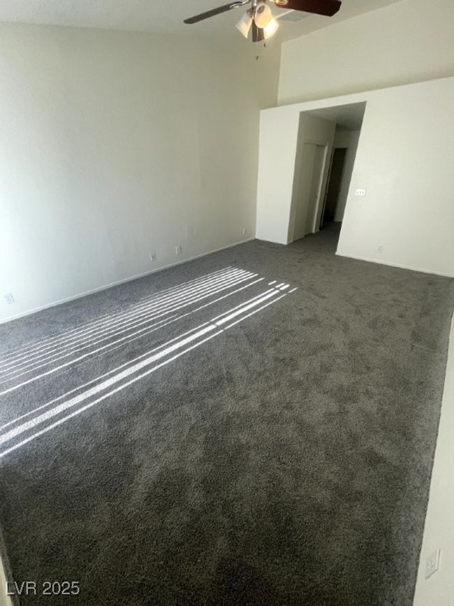 Spare room with carpet flooring and ceiling fan | Image 11