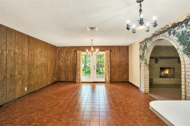 Large formal dining room as you walk in. | Image 8