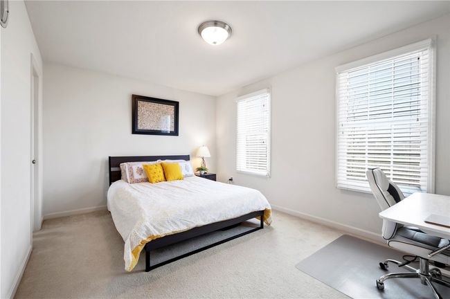 View of the second bedroom. This room includes a walk-in closet. | Image 18