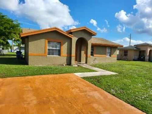 1420 Nw 3rd Ter, Pompano Beach, FL, 33060-5571 | Card Image